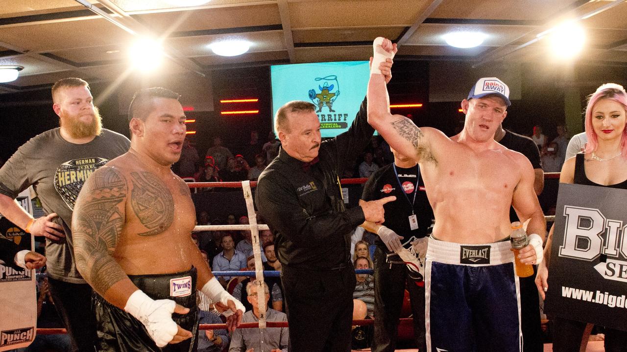 Paul Gallen and Herman Ene-Purcell fight it out in Toowoomba. Friday, Jan 29, 2016.