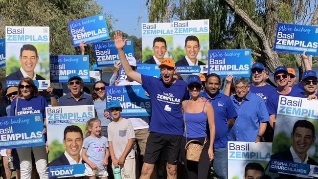 Liberal candidate for Churchlands Basil Zempilas with wife Amy and supporters at Jackadder Lake in Woodlands.