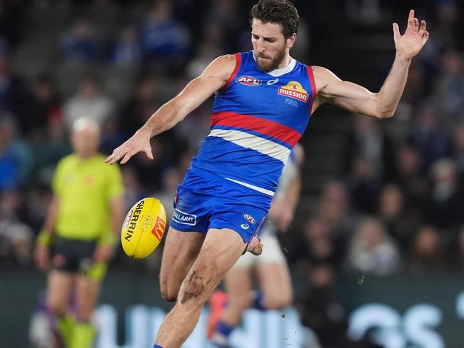 MELBOURNE, AUSTRALIA - JUNE 29: Marcus Bontempelli of the Bulldogs kicks the ball during the round 16 AFL match between North Melbourne Kangaroos and Western Bulldogs at Marvel Stadium, on June 29, 2024, in Melbourne, Australia. (Photo by Daniel Pockett/Getty Images)