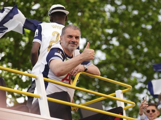 Tottenham Hotspur manager Ange Postecoglou on the open-top team bus during the Europa League winners parade in North London. Picture: AP Photo