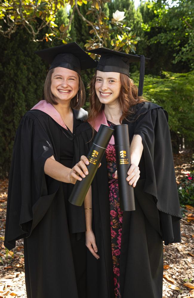 Dani Challacombe (left) and Sarah Mitchell celebrate graduating together with a Bachelor of Education (Secondary) at a UniSQ graduation ceremony at The Empire. Sarah graduates with Distinction, Tuesday, October 29, 2024. Picture: Kevin Farmer