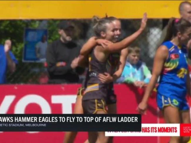 Hawks stay top after hammer win