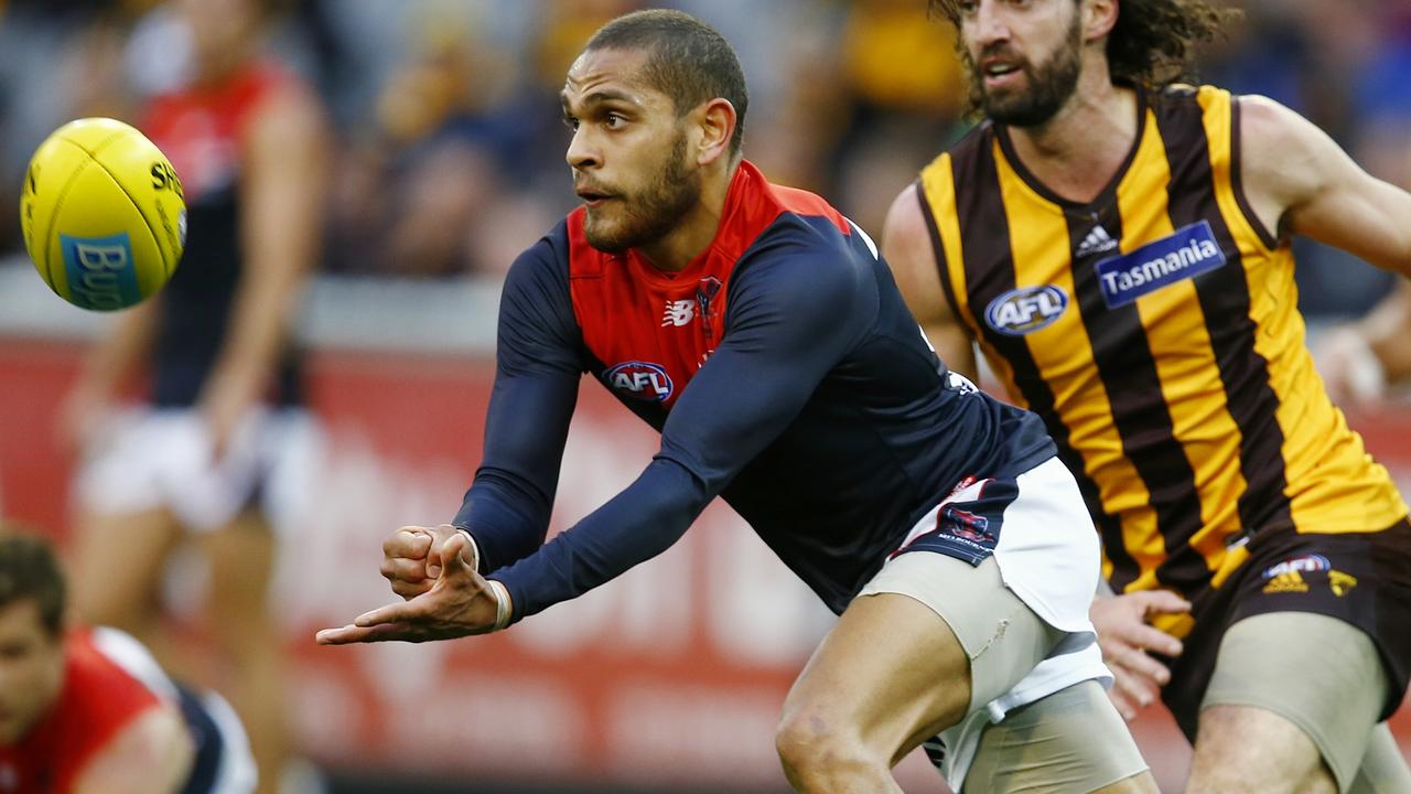 AFL Round 20 Hawthorn v Melbourne at the MCG. Dom Barry clears by hand . Pic: Michael Klein. Saturday August 9, 2014.