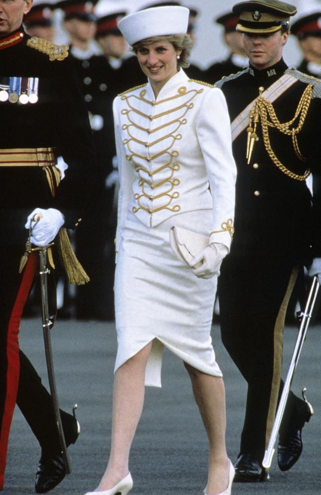 Princess Diana in a military-inspired suit by Catherine Walker paired with a Graham Smith hat to the Sandhurst Military Academy in 1987. Picture: Anwar Hussein / Getty Images