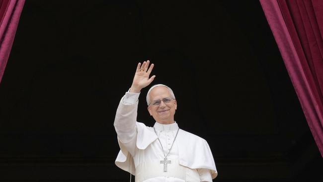 Pope Leo XIV appears on the central balcony of St Peter's Basilica at the Vatican to bless the crowd below. Picture: AP /Gregorio Borgia