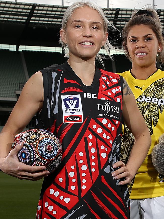 Bombers midfielder and vice-captain Courtney Ugle is a proud Noongar woman and plays a pivotal role in Essendon FC’s First Nations Women’s Pathway Program. She is seen here at Dreamtime at the G. with Richmond’s Natasha Bamblett. Picture: Michael Klein