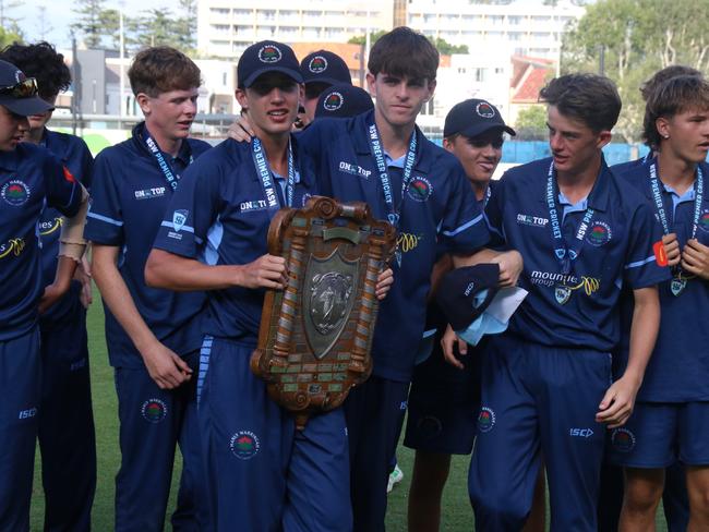 Manly players gather around the AW Green Shield. Picture: Warren Gannon Photography