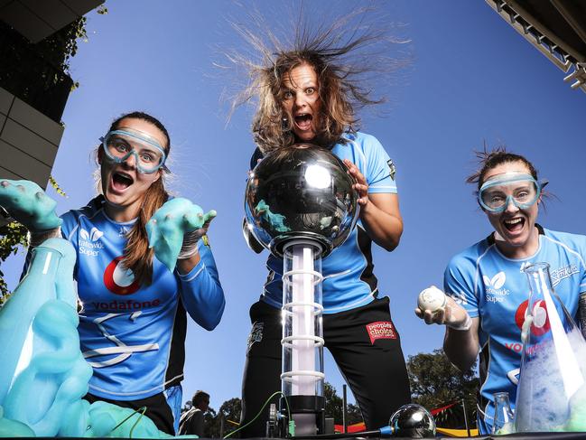 Adelaide Strikers Alex Price, captain Suzie Bates and Sarah Coyte, get into experiment mode ahead their opening game in the WBBL thanks to SciWorld. Picture: SARAH REED