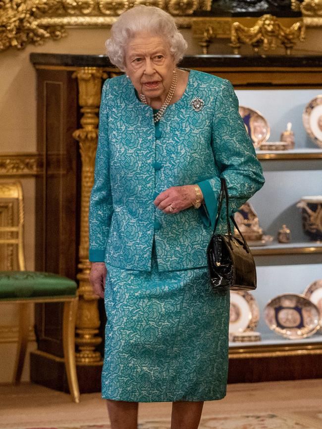 Queen Elizabeth attends a reception to mark the Global Investment Summit, at Windsor Castle in Windsor on Tuesday.