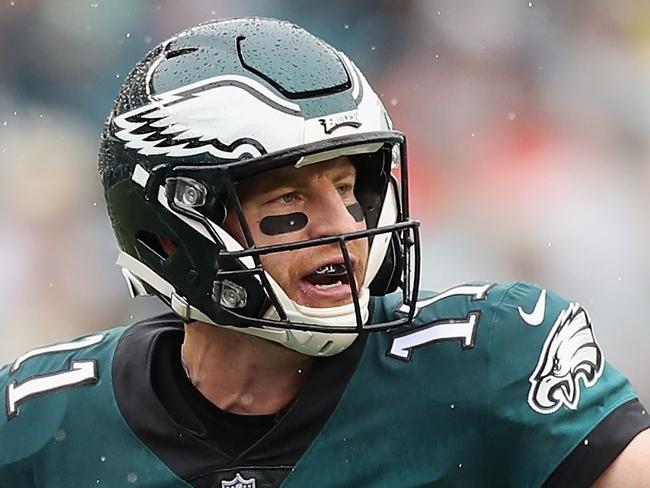 PHILADELPHIA, PA - SEPTEMBER 23: Quarterback Carson Wentz #11 of the Philadelphia Eagles reacts against the Indianapolis Colts in the first quarter at Lincoln Financial Field on September 23, 2018 in Philadelphia, Pennsylvania.   Elsa/Getty Images/AFP == FOR NEWSPAPERS, INTERNET, TELCOS & TELEVISION USE ONLY ==