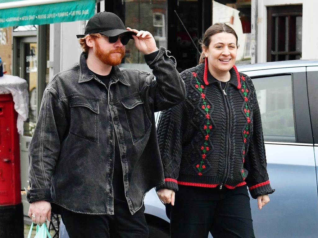 Harry Potter star Rupert Grint was spotted with his wife Georgia Groome after being ordered to pay a $3.5million tax bill. Picture: NASH / BACKGRID