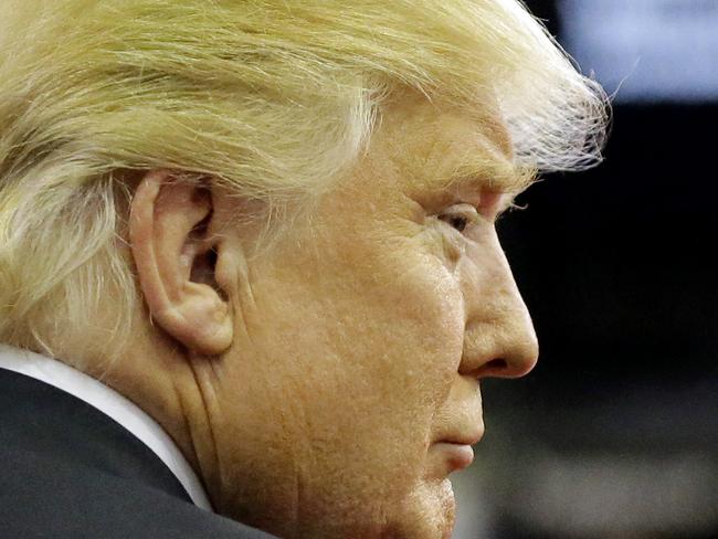 Republican presidential candidate, businessman Donald Trump pauses in the Spin Room after a Republican presidential primary debate at The University of Houston, Thursday, Feb. 25, 2016, in Houston. (AP Photo/David J. Phillip)