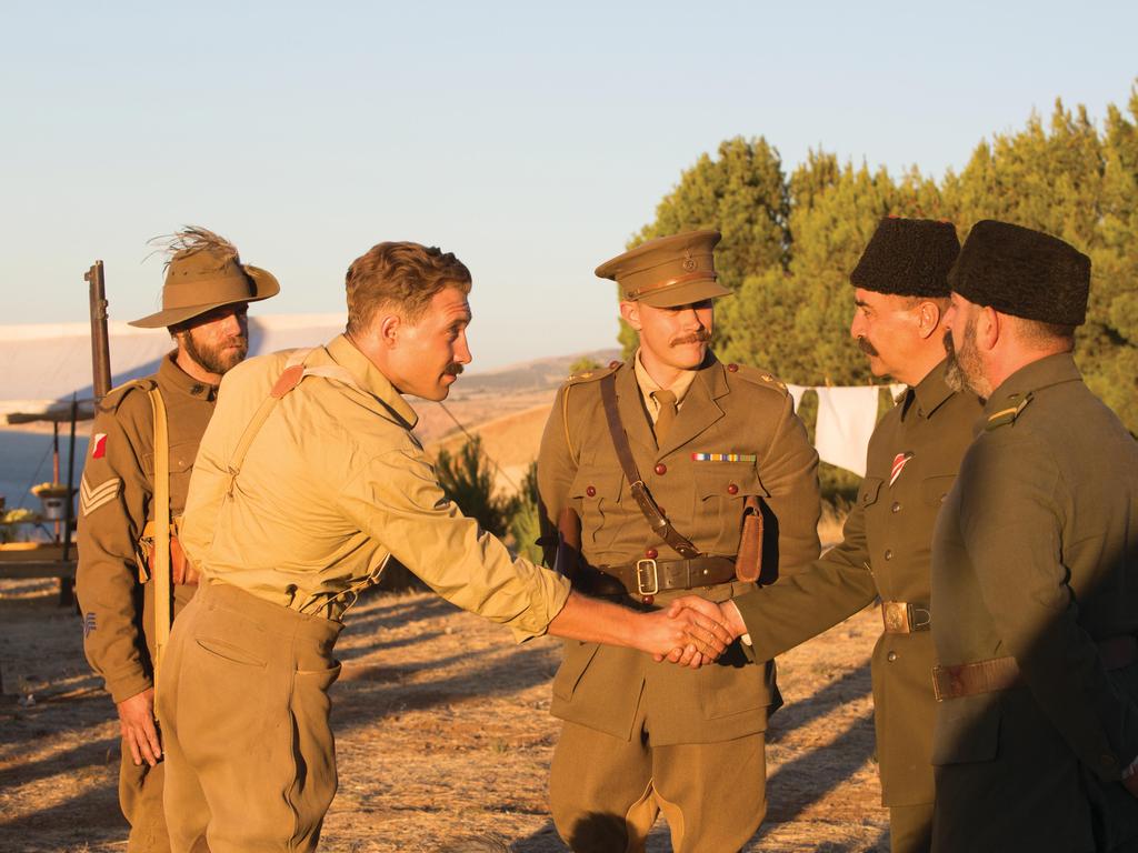 Sgt Tucker played by Christopher Sommers, Lt Col Hughes played by Jai Courtney, Lt Greeves played by Michael Dorman, Major Hasan played by Yilmaz Erdogan and Jemal played by Cem Yilmaz in a scene from The Water Diviner, directed by Russell Crowe. In cinemas December 26, 2014. Picture: Universal