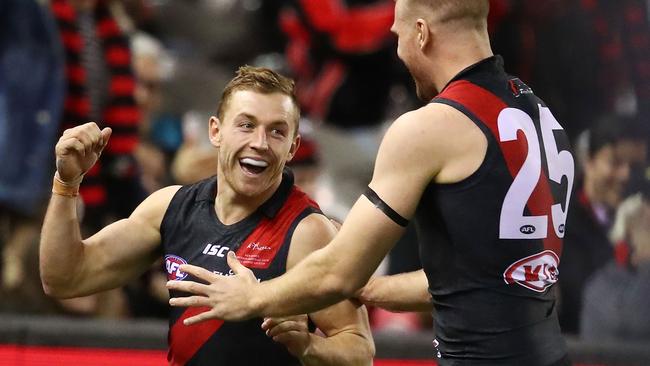 Essendon trade acquisitions Devon Smith and Jake Stringer.