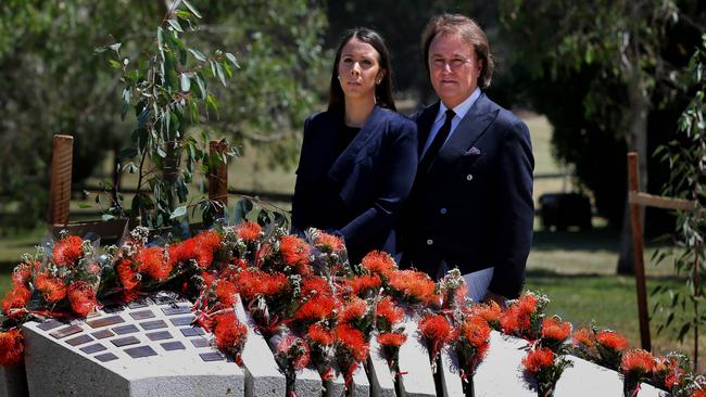 Joseph Giardina and his daughter Carla at a memorial to those lost in the 2004 Indian Ocean tsunami unveiled today in Kings Park on the shores of Canberra's Lake Burley Griffin.