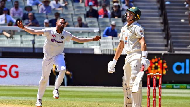 India's Mohammed Siraj celebrates dismissing Australia's Marnus Labuschagne on the first day of the second Test. Picture: AFP