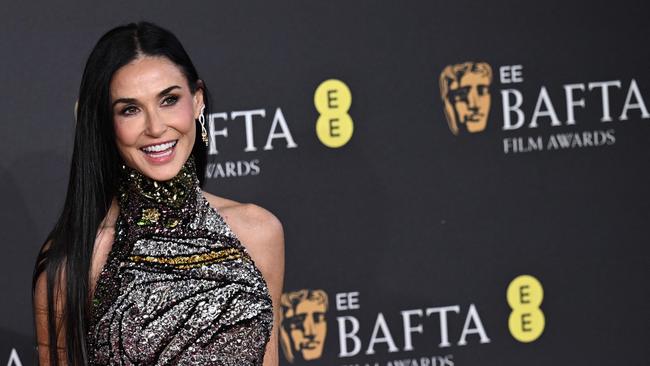 The Substance star Demi Moore poses on the red carpet upon arrival at the BAFTA awards. Picture: Ben Stansall/AFP