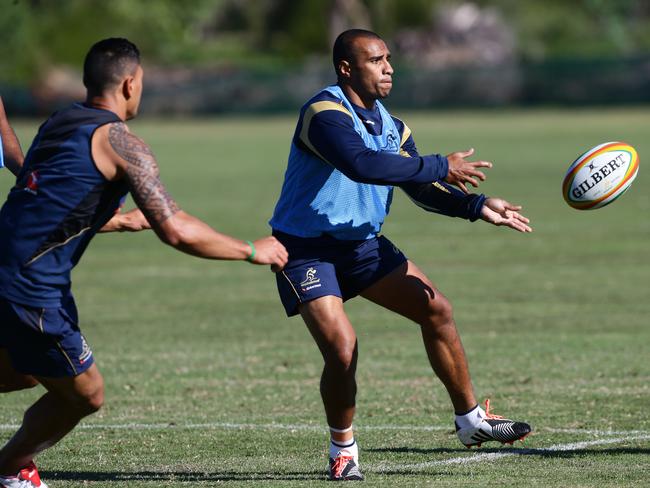 Will Genia gets a pass away at Wallabies training in June during the three-Test series against France.