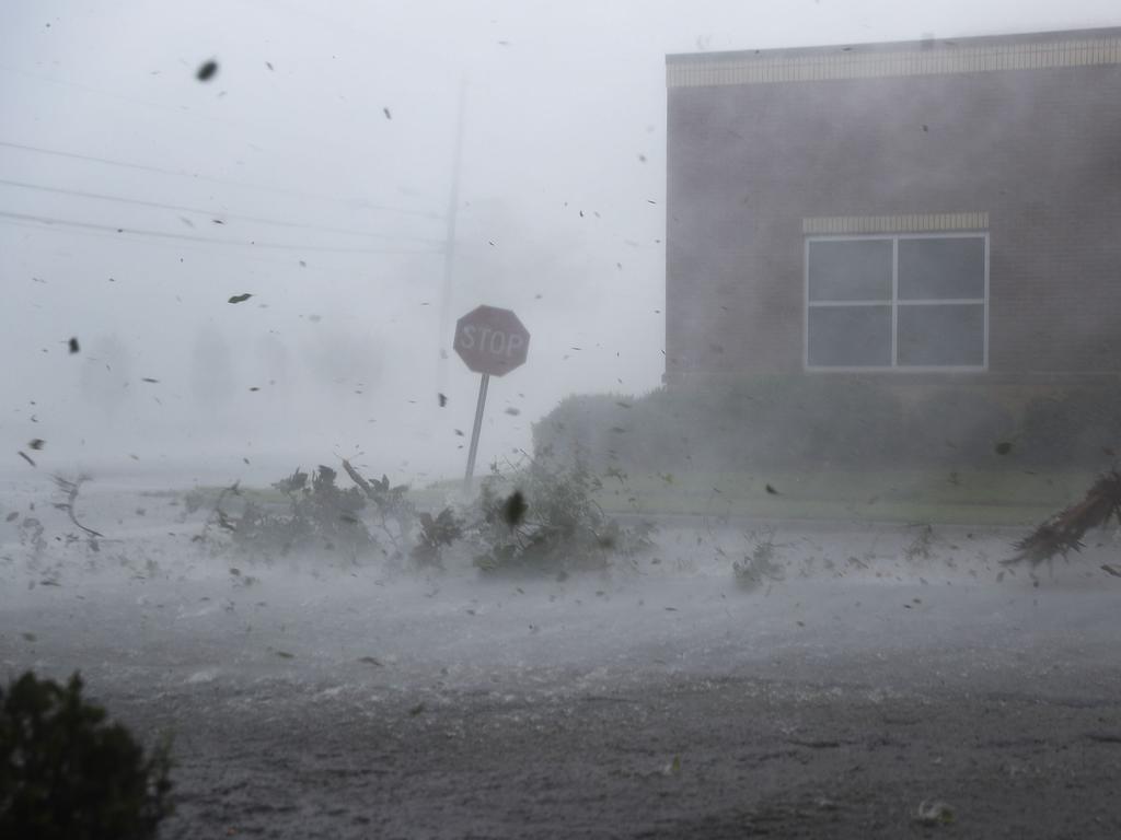 Debris is blown down a street by Hurricane Michae. Picture: Joe Raedle/Getty Images/AFP