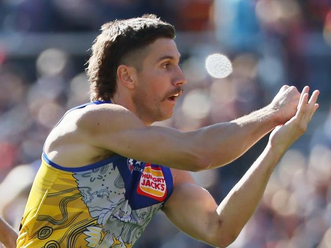ADELAIDE, AUSTRALIA - MAY 25: Jake Soligo of the Crows tackles Liam Baker of the Eagles during the 2025 AFL Round 11 match between Kuwarna (Adelaide Crows) and Waalitj Marawar (West Coast Eagles) at Adelaide Oval on May 25, 2025 in Adelaide, Australia. (Photo by James Elsby/AFL Photos via Getty Images)