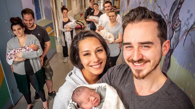 Sunshine Connelly and Jacob McKay with baby Leo (front), Tamar and Dean McDonald with Zara (left), Larissa and Jared Rawlings with Mia (right), Emily Ramsay with Brodie (back left) and Nathan and Rachel Hillman with their baby boy. Picture: Jake Nowakowski