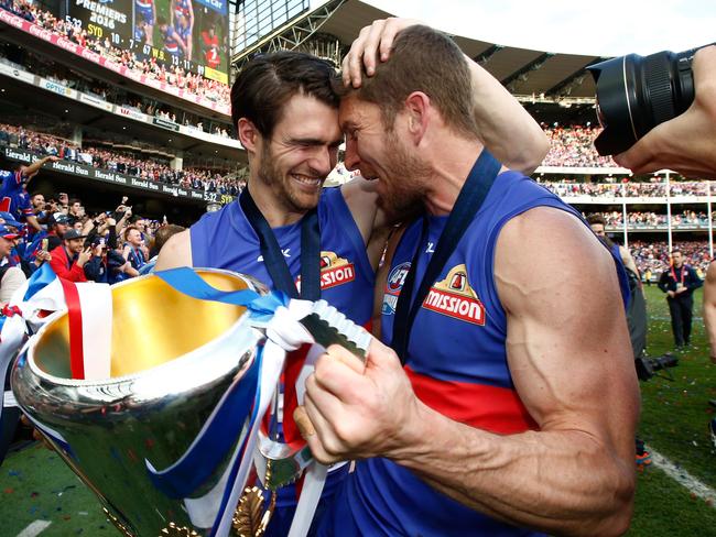 Easton Wood and Matthew Boyd celebrate Western Bulldogs’ 2016 premiership.