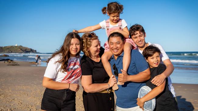 Michelle and Francis Kyan with their four kids Adele 4, Elijah 10, Ava 13, Xavier 16 on Lighthouse Beach in Port Macquarie. Pic: Lindsay Moller Productions