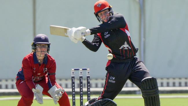 Melbourne keeper Teagan Parker and EMP batter Sam Bates. Picture: Valeriu Campan