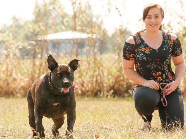 Kristie Bambach and her Staffy/Great Dane cross Tyson at the new Palmerston dog park. Picture GLENN CAMPBELL