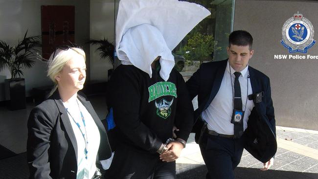 Detectives arrest the man at a business in Parramatta on May 1. Picture: NSW Police