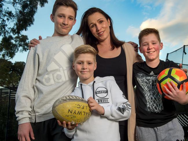 Anita Dillon with her 3 boys, Jonah, 13, Taj, 9, and Cadel, 8. Picture: Jay Town