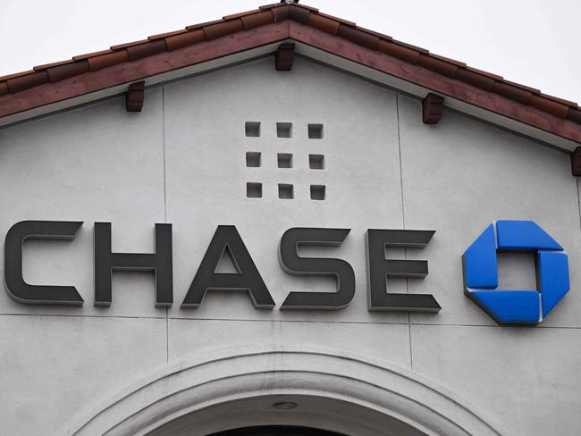 Signage is displayed outside of a Chase Bank branch in Redondo Beach, California, on March 13, 2023. - US President Biden sought to reassure Americans over the country's banking system on Monday, while insisting emergency measures would not be paid for by taxpayers, as additional banks came under stress following the collapse of Silicon Valley Bank last week, the second largest bank failure in history, and New York regulators took control of Signature Bank on Sunday. (Photo by Patrick T. Fallon / AFP)