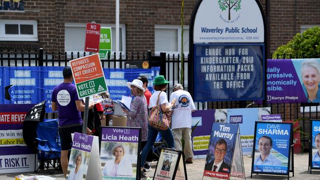 Voting day in Wentworth. An exit poll pointed to the importance in the Sydney electorate of the issue of climate change. Pic: AAP