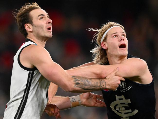 MELBOURNE, AUSTRALIA - JULY 15: Jeremy Finlayson of the Power and Tom De Koning of the Blues compete in the ruck during the 2023 AFL Round 18 match between the Carlton Blues and the Port Adelaide Power at Marvel Stadium on July 15, 2023 in Melbourne, Australia. (Photo by Morgan Hancock/AFL Photos via Getty Images)