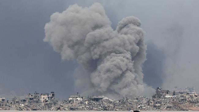 Smoke rises over the Gaza Strip on Thursday after Israeli strikes. Picture: AFP