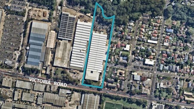 An aerial view of the site which is surrounded by a creek, homes and other industrial businesses. Picture: Nearmaps