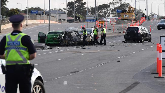 Major Crash officers examine the scene where Nicole Tucker died at Bedford Park. Picture: Campbell Brodie