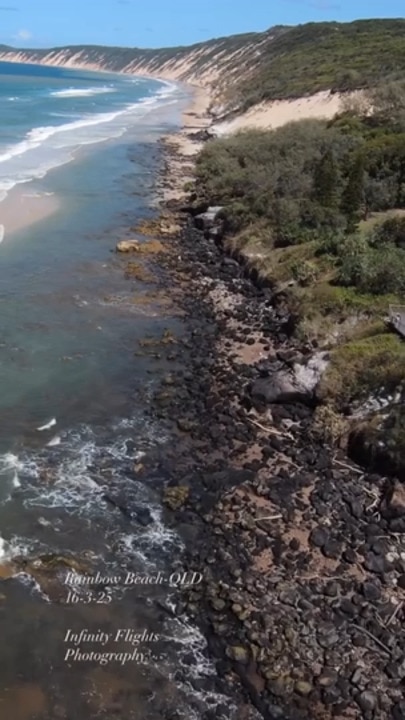 Rainbow Beach erosion exposes massive rocks