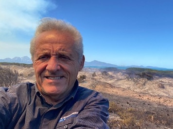 Dolphin Sands resident Harry Curry showing the scale of destruction around his property. Picture: Supplied