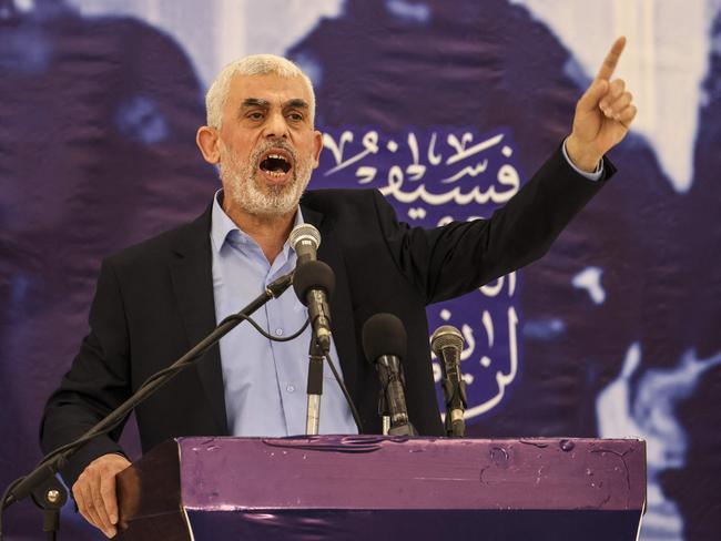 (FILES) Head of the political wing of the Palestinian Hamas movement in the Gaza Strip Yahya Sinwar speaks during a meeting in Gaza City on April 30, 2022. Israel's foreign minister has called to "swiftly eliminate" Yahya Sinwar, who was appointed by Hamas on August 6, 2024 as the militant group's new political leader replacing Ismail Haniyeh who was killed in Tehran last week. (Photo by Mahmud HAMS / AFP)