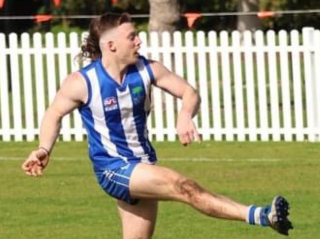 Dylan Sanderson gets his kick away. Picture: Figtree Kangaroos