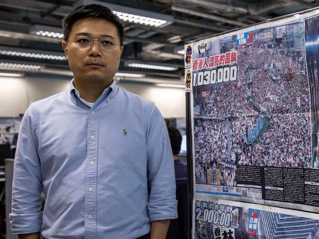 Apple Daily editor-in-chief Ryan Law posing for a portrait in the newsroom in Hong Kong.