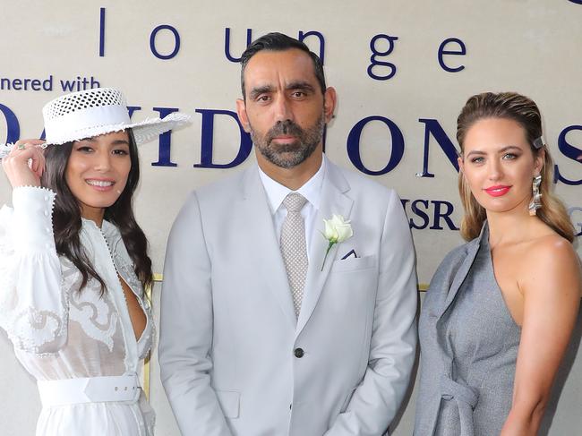 Jess Gomes, Adam Goodes and Jesinta Franklin attend the David Jones Marquee on Caulfield Cup Day. Picture: Scott Barbour, Getty Images.