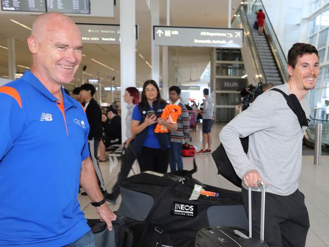 FIRST TEAM ARRIVES - Riders and support staff from British professional cycling team INEOS Grenadier landed at Adelaide Airport  Thursday 5th January, at 9:05am, marking the first team to arrive for the 2023 Santos Tour Down Under. TDU Director, Stuart OÃGrady, there to greet the team, with Ben Swift (R). 5 January 2023. Picture Dean Martin