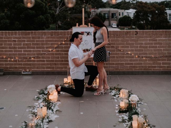 Melissa Gallacher proposed to Alyce McAvoy on the roof of their Peakhurst apartment. Picture: James Simpson Photography/My Proposal Co