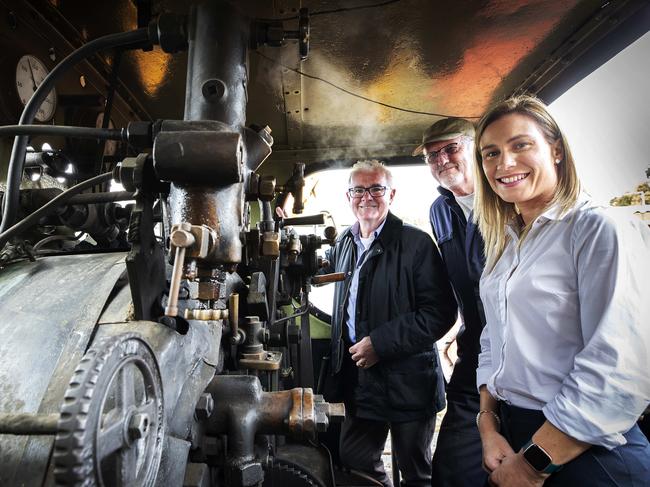 Kristie Johnston, right, during her time as Glenorchy Mayor, with Federal Independent MP Andrew Wilkie, left, and fireman Ian Bailey, at the Tasmanian Transport Museum. Picture: Chris Kidd