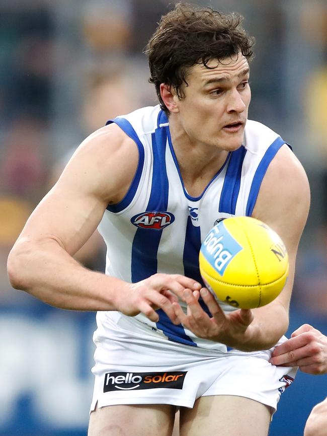 Scott Thompson in action for North Melbourne.