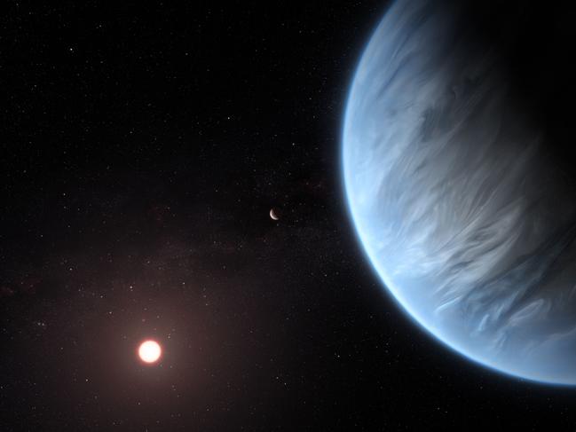 A handout artist's impression released on September 11, 2019, by ESA/Hubble shows the K2-18b super-Earth, the only super-Earth exoplanet known to host both water and temperatures that could support life. - For the first time, water has been discovered in the atmosphere of a exoplanet with Earth-like temperatures that could support life as we know it, scientists revealed on September 11, 2019. (Photo by M. KORNMESSER / ESA/Hubble / AFP) / RESTRICTED TO EDITORIAL USE - MANDATORY CREDIT "AFP PHOTO /ESA/HUBBLE/M.KORNMESSER " - NO MARKETING - NO ADVERTISING CAMPAIGNS - DISTRIBUTED AS A SERVICE TO CLIENTS