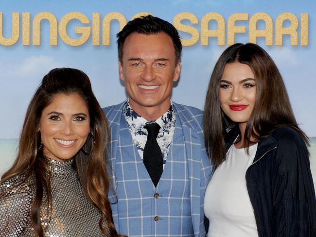 McMahon with his American wife Kelly and daughter Madison at the Melbourne premiere of Swinging Safari in December. Picture: Andrew Henshaw