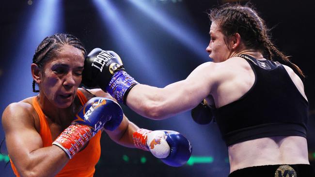 Katie Taylor of Ireland trades punches with Amanda Serrano of Puerto Rico. Photo by Sarah Stier/Getty Images
